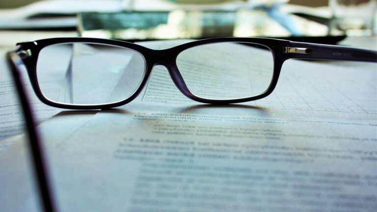 Spectacles sitting on document