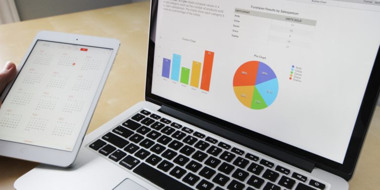 open laptop displaying graphs