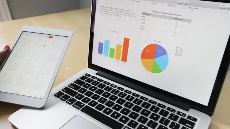 open laptop displaying graphs